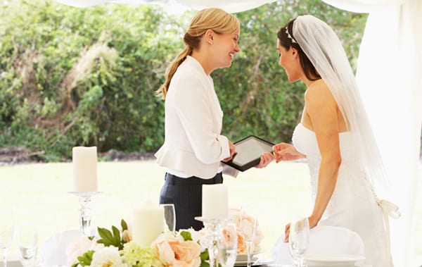 Bride With Wedding Planner In Marquee