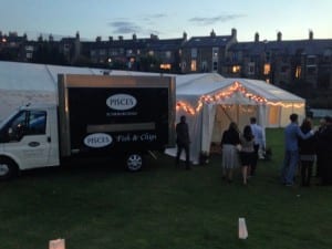 Our Branded fish and chip van outside a summer wedding marquee