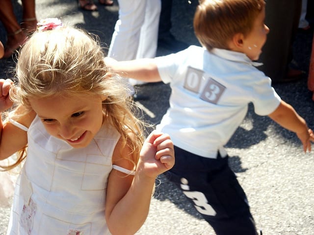 Children playing in front of mobile catering burger van