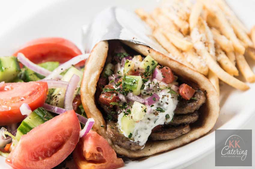 Gyros souvlaki with fries and salad