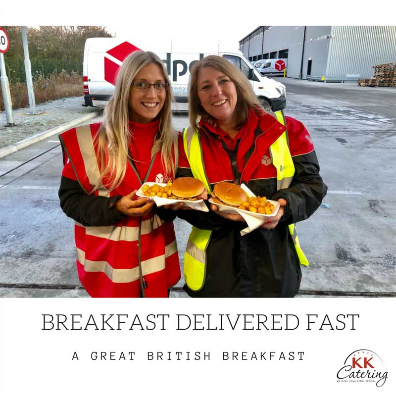 customers outside kkcatering butty van with bacon and sausage baps