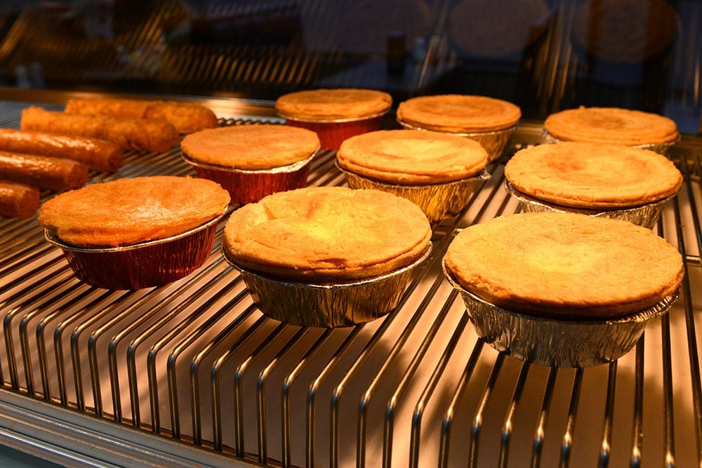 Pies cooking in an oven